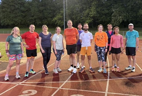 Runners at varying paces during a Fartlek session at GSK car park